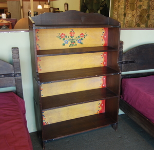 Rare Monterey painted open bookcase in dark finish